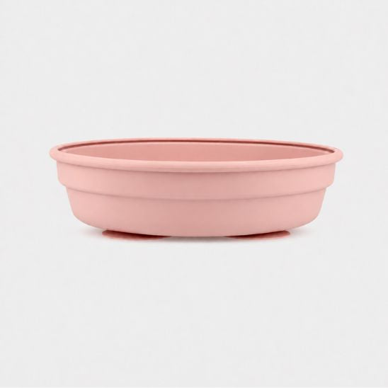 Coque en silicone rose seule, sans le plateau inox, vue de trois quarts
