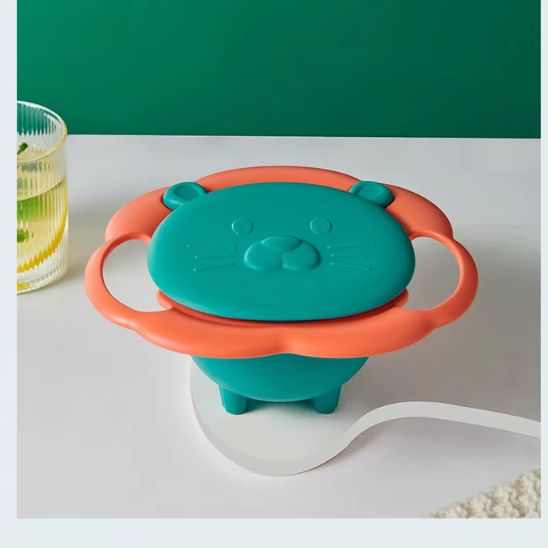 Bol anti renversement bébé jaune avec cuve violette, système gyroscopique 360°