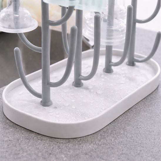 Égoutte biberon bébé avec bac récupérateur d’eau pour une cuisine propre